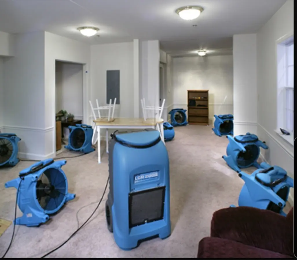 Air movers and dehumidifier setup for Water Damage Restoration in Salem